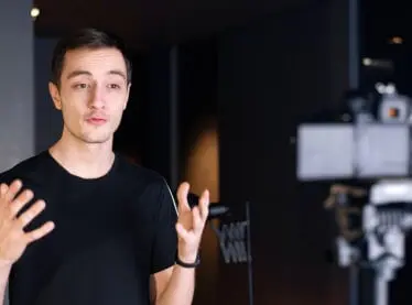 An actor wrapping up their self tape audition with a button.