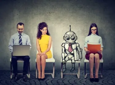 A group of actors on a casting call sitting next to a cartoon robot, also waiting to be called.