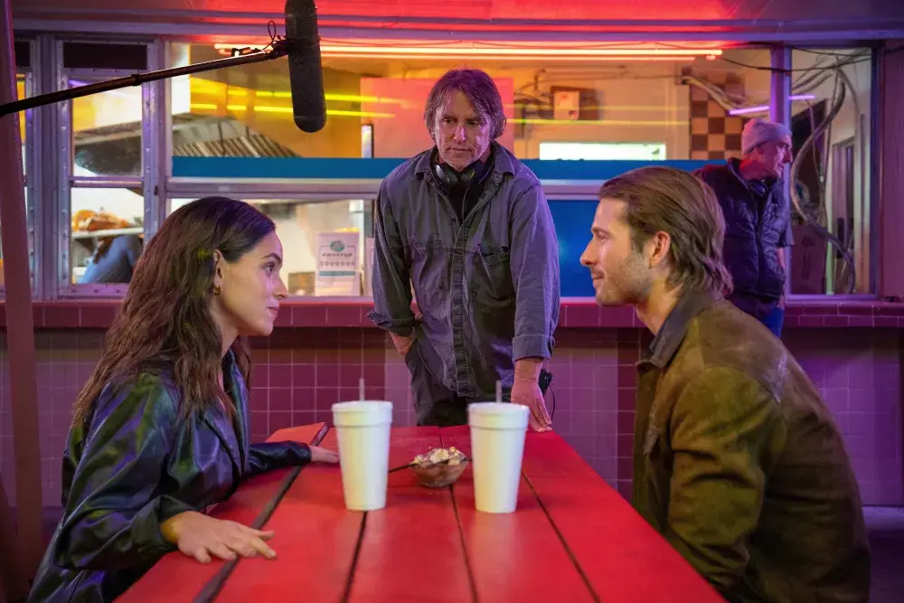 Performing Up: Adria Arjona Retains Everybody Guessing With Her Stellar Efficiency in Richard Linklater’s ‘Hit Man’ Performing Up: Adria Arjona Retains Everybody Guessing With Her Stellar Efficiency in Richard Linklater’s ‘Hit Man’
