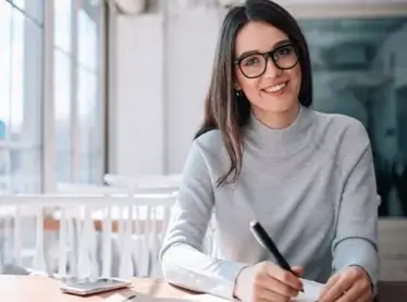 An actress jotting down multiple ways to impress a director.